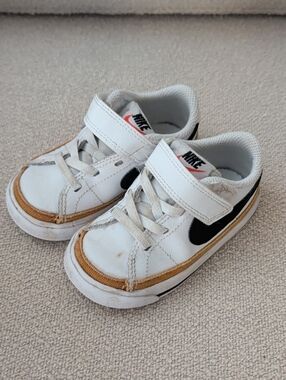 Nike Kids White Sneakers with Black Swoosh and Tan Trim